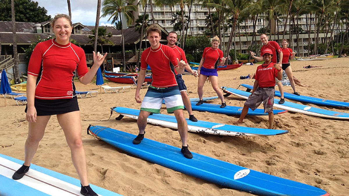 A group surf lesson on Kalapaki Bay, Kauai