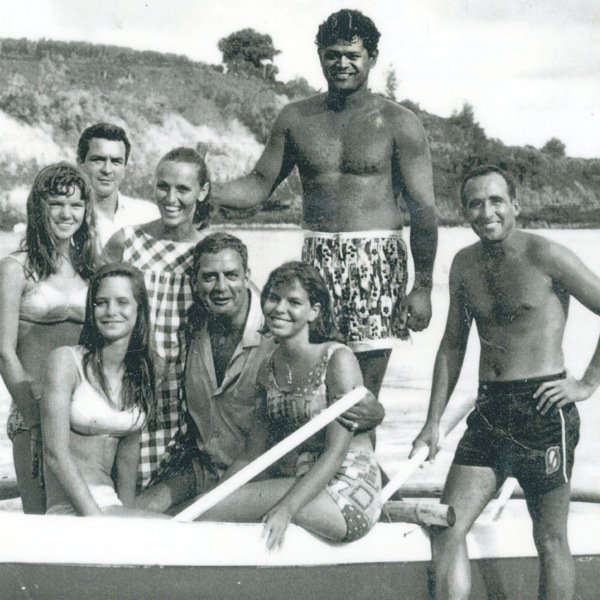 Raymond Burr and family with Percy Kinimaka at Kalapaki Bay, Kauai