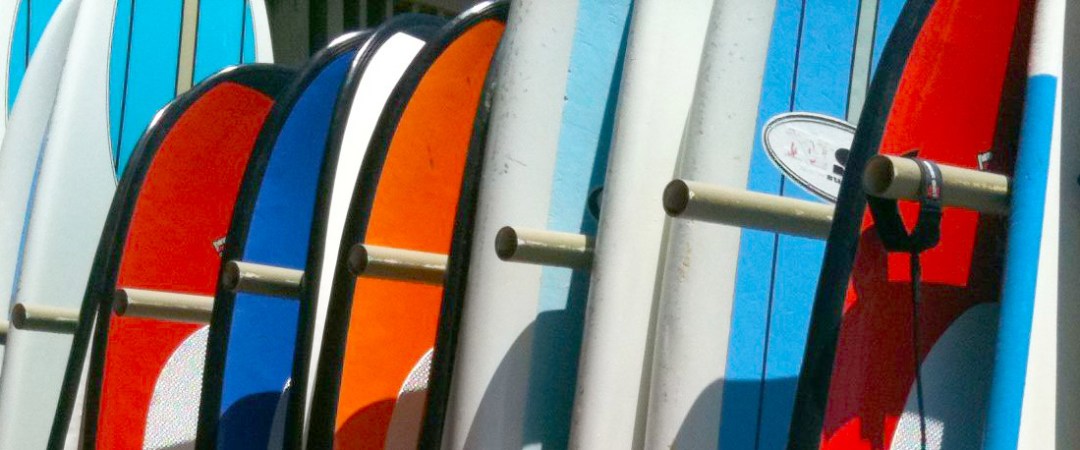 a boat sitting on top of a surfboard