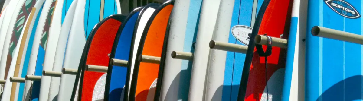 a boat sitting on top of a surfboard