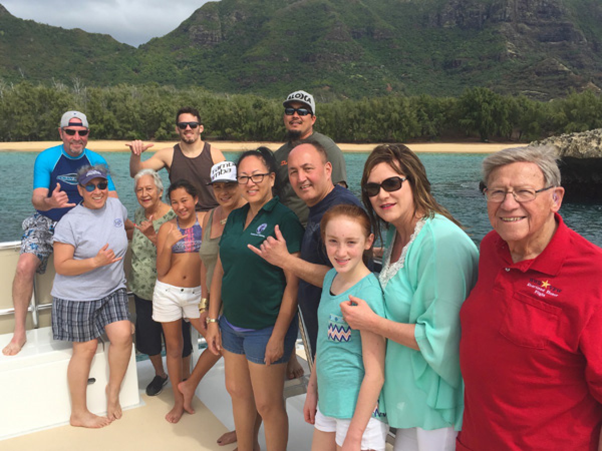 a group of people posing for a photo
